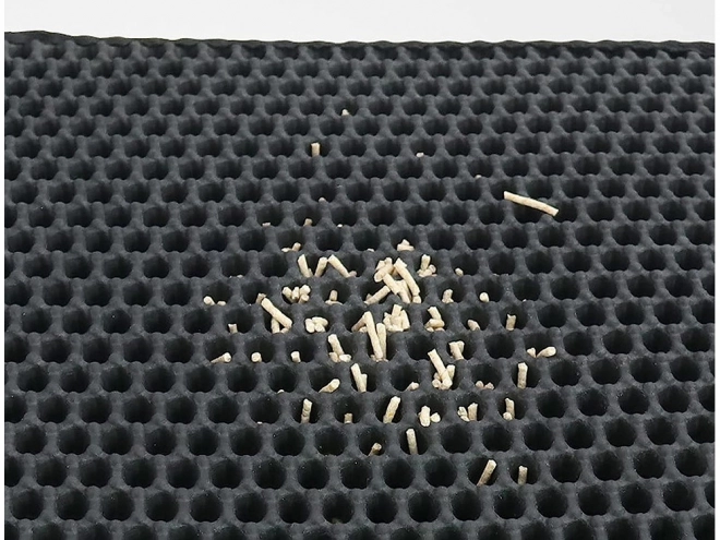 Mat voor kattenbak met hexagonaal patroon