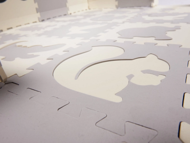 Contrasterende beige schuimpuzzels met diertjes