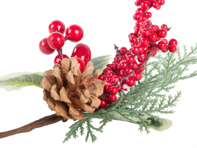 Kersttafeldecoratie met lijsterbes en dennenappel