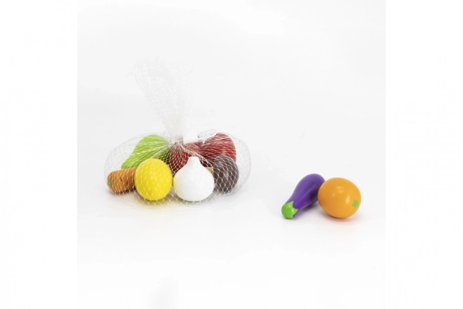 Houten fruit en groenten in netje