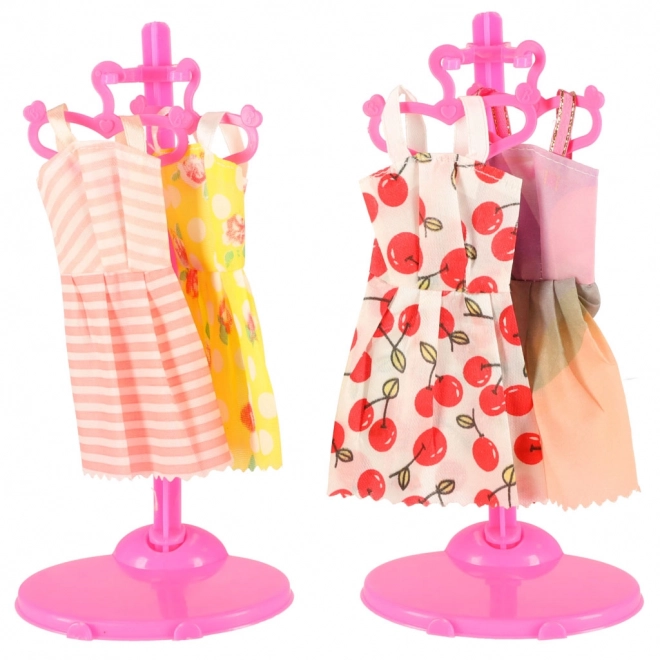 Kleding en accessoires voor poppen - 85 stuks