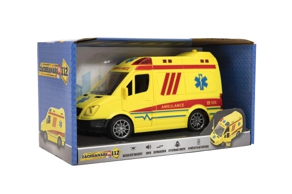 Auto ambulance plastic 20cm op trekveer op batterijen met geluid en licht in doos 26x15x12cm